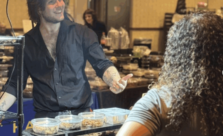 A picture of a man smiling at a woman